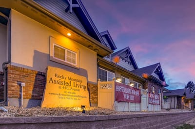 Exterior view of Rocky Mountain Assisted Living facility at sunset