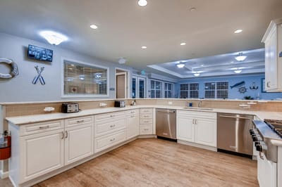 Bright, spacious kitchen area with modern appliances