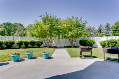Outdoor garden area with flowering planters