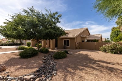 Exterior view of a sunny assisted living facility
