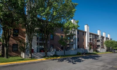 Exterior view of a nursing home facility with trees
