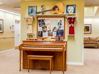 Decorative display with a piano and musical instruments