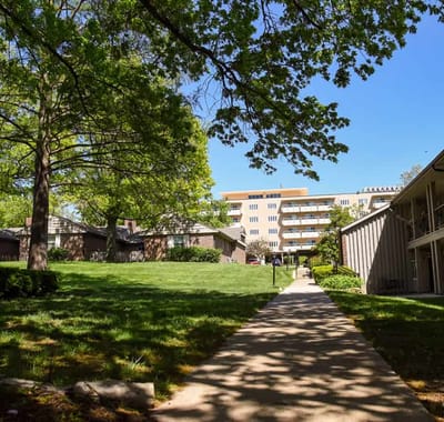 Pathway leading through a vibrant senior living community