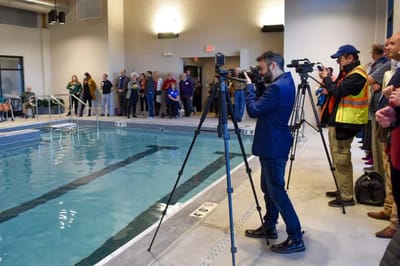 Residents and staff at indoor pool event