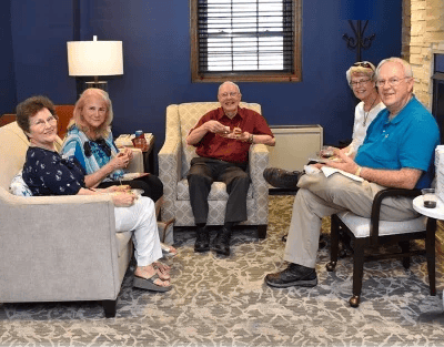 Residents enjoying a social gathering in a lounge