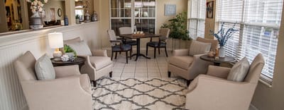 Bright common area with comfortable seating and natural light