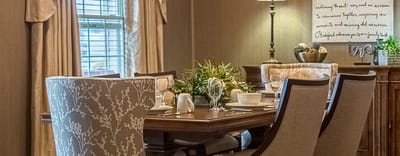 Elegant dining room setup with decorative chairs and table