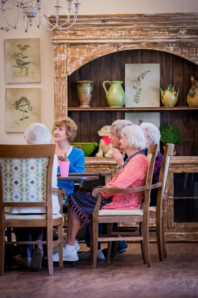 Residents enjoying each other's company in a cozy setting