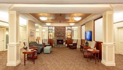 Bright common area with comfortable seating and decor