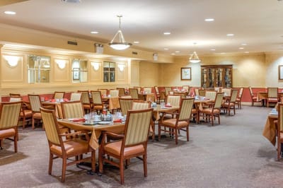 Dining area with tables set for service
