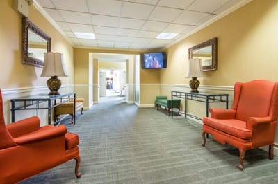 Interior hallway with seating and decorative elements
