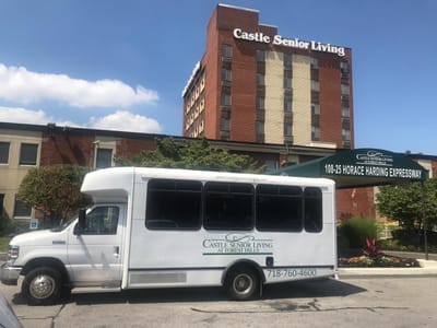 Facility transport van parked outside the building