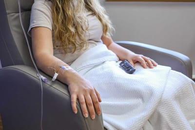 Patient receiving treatment in a comfortable chair