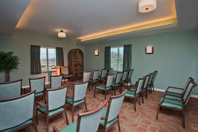 Empty activity room with chairs arranged