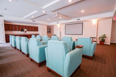 Interior of a cozy activity room with teal seating
