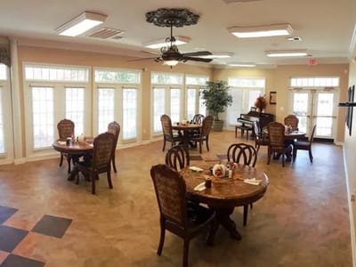 Dining area with tables and chairs for residents