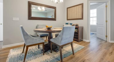Stylish dining area with a table and chairs