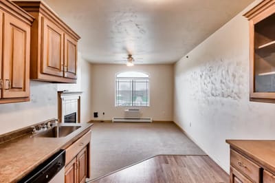 Interior view of a resident apartment with kitchen area