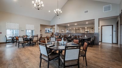 Dining area with tables set for residents