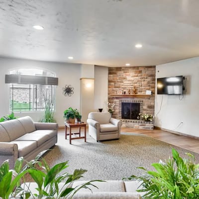 Cozy common area with seating and fireplace