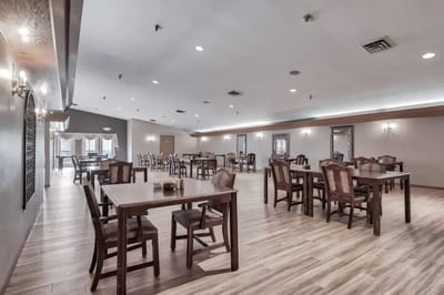 Dining room with wooden tables and chairs