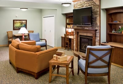 Cozy common area with seating and fireplace