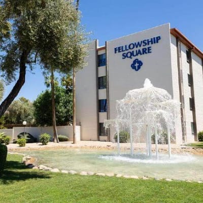 Exterior view of the Fellowship Square facility with fountain