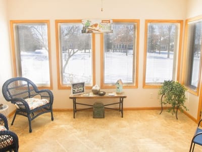 Bright common area with windows and seating