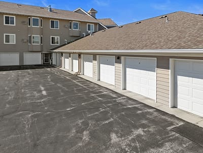 Exterior view of a building with garages