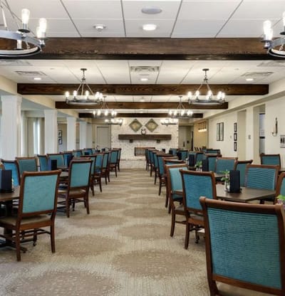 Interior view of a dining area with tables and chairs