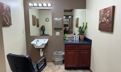 Interior view of a salon area with decor and equipment