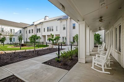 Pathway in a landscaped outdoor space with seating