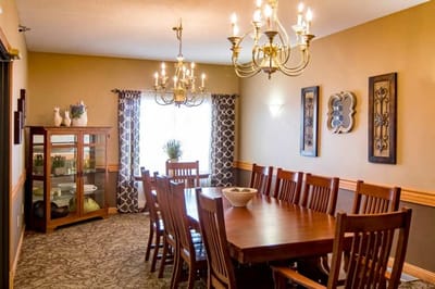 Elegant dining room with wooden tables and chairs