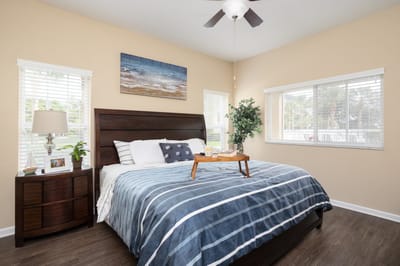 Cozy resident room with a bed and natural light