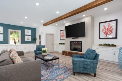 Common area with seating and fireplace