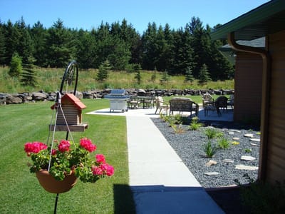Outdoor space with seating and flower planters