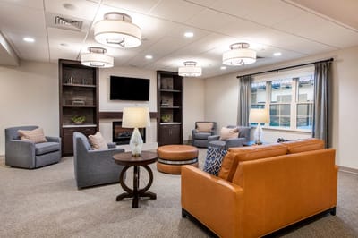 Comfortable common area with seating and lighting