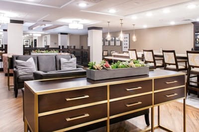 Elegant common area with seating and greenery