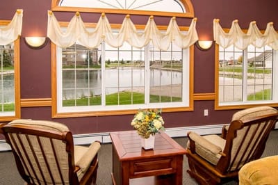 Cozy interior seating facing a scenic view