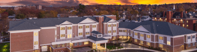 Aerial view of the facility at sunset