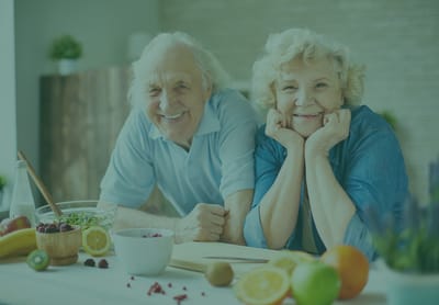 Emerald Nursing & Rehab Omaha, Nursing Home in Omaha, NE — Elderly couple enjoying a cooking activity together