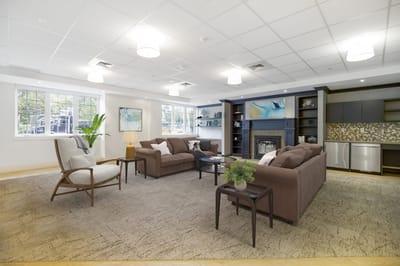 Common area with seating and natural light