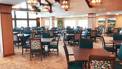 Bright dining room with tables and chairs