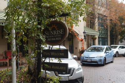 Signage for Sunrise Senior Living with facility details