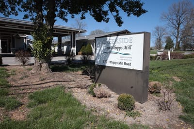 Exterior view of Creekside on Whipps Mill Road sign
