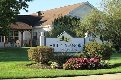 Sign for Abbey Manor assisted living facility