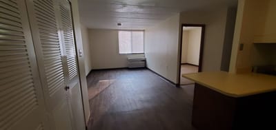 Bright interior of a resident room with light flooring