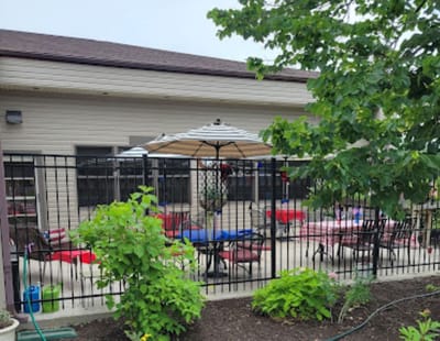 Outdoor patio area with tables and umbrellas