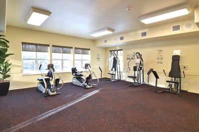 Well-equipped fitness room with exercise equipment