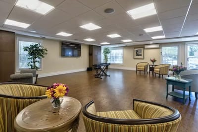Bright common area with seating and natural light